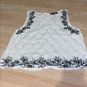 Black and white floral lace sleeveless blouse